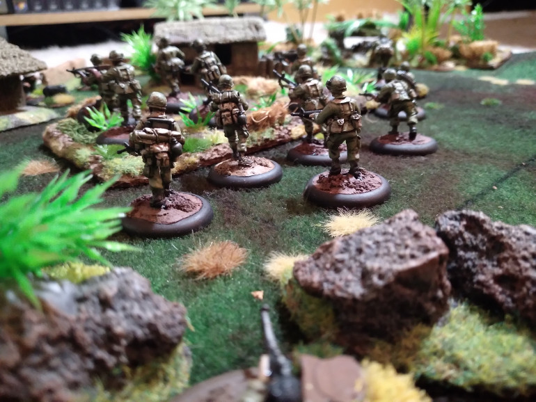 Squads first game on the table and they spend most of the game supressed by sniper fire from the rear.