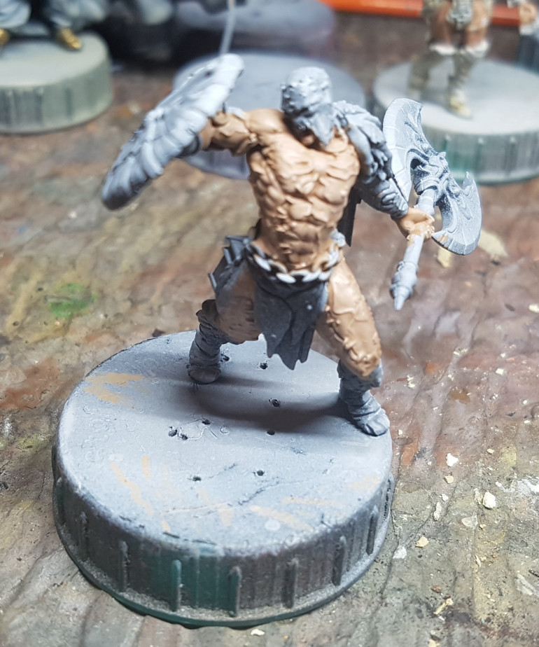 What is going on with this guy?  Is he wearing something stitched, or are those scars?  It looks like flesh.  He has abs and nipples on display, but I can't really tell where his boots end and his legs begin.  Googling for painted examples just confused the issue.  I painted him as flesh but have since looked at his list of equipment.  He's wearing full body Gorm Flesh armour.  I haven't painted my Gorm or even thought about what colours I'll use there.  He's getting put on one side until I do work on the Gorm, and will likely get completely repainted then.
