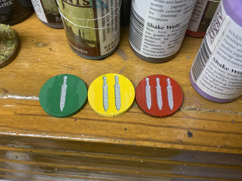 Army Painter spray and silver Sharpie.