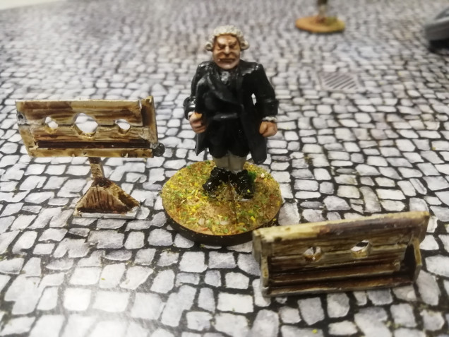 Any player mini taken out of action is transfered to the stocks and the pillory under arrest. I thought it would be good to give them a chance to get back in the game with the use of some random cards. 