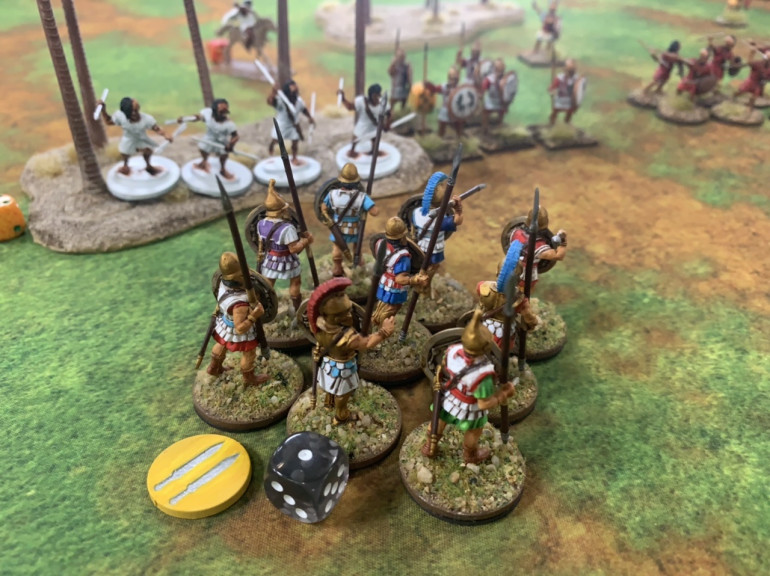 The severely depleted Numidians fall back into the palm grove. 