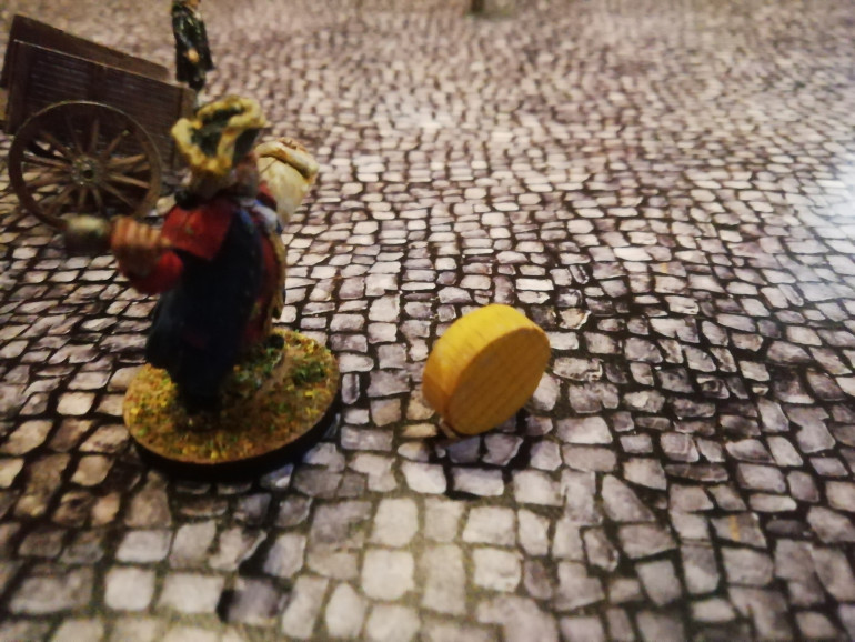 The Mayor arrives and mob B gives up a cheese in an attempt to claim a victory point and recreate history. They roll a cheese which succeeds in knocking him down but fails to take the mayor out. It also meant a cheese was left unguarded by his prone body 