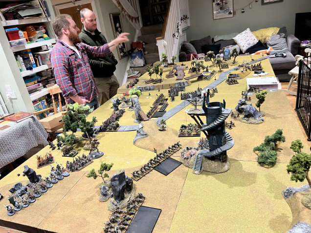 My left flank and centre advance, centre receives a storm of fire. The left flank distracts some chaps hard hitters while my right flank just punches them hard! Two giants and many orcs in a confined space cause a lot of damage!