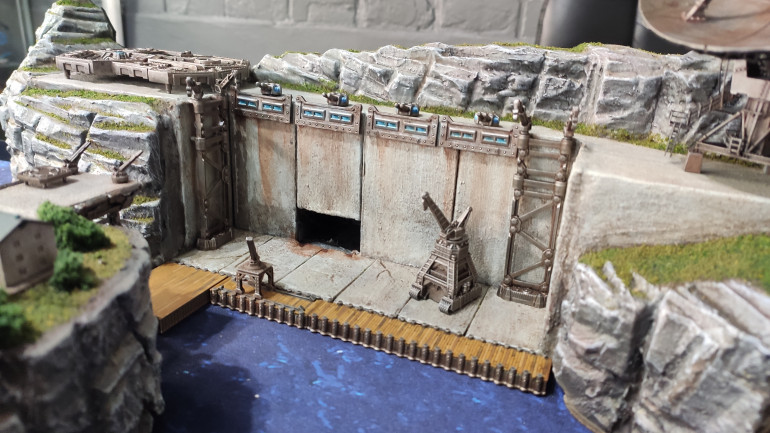 More WIP for the dockyard after adding some parts from an an ancient airfix kit and the newest terrain sprue from Warcradle.
