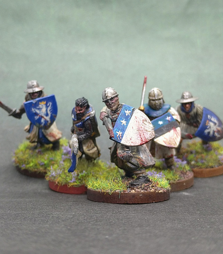 Archibald of Douglas with his pennant and foot sergeants. Archie holds the three star shield, but his men have an additional black band to show they are kin or trusted retinue but they are not The Douglas.