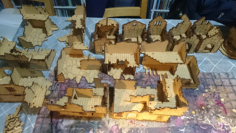 And so, heartily sick of MDF as I was after the Stargrave town, I picked up Frostgrave and started building a ruined town, with hindsight I would have added a lot more of the paint pre -assembly, and cleaning the MDF really does make a difference.