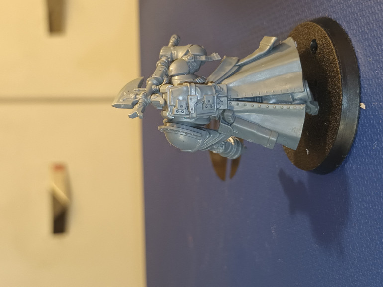 I did not want to use a space marine backpack as it is too distinctive, as luck would have it the Orlock sprue has a couple of back packs that fit over the protruding connector on his back perfectly with no trimming.