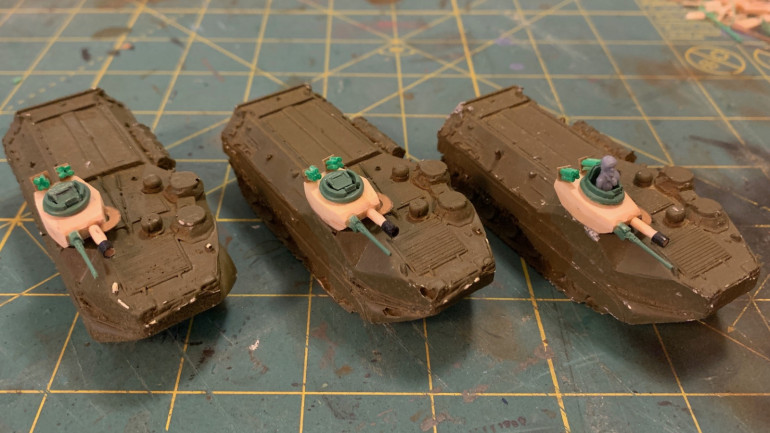 Scratch-built turrets to the AAV-7 model.  Hatches, commander, and .50 cals from the bits box.  everything else (including the Mk19 AGLs) are scratch-built from scrabble tiles, plastic broom bristles, toothpicks, and electical tape.