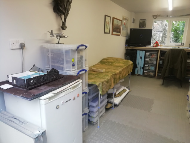 Keeping the fridge for beer storage. I had a huge pile of spare foam board so it now lives under my fold out table 