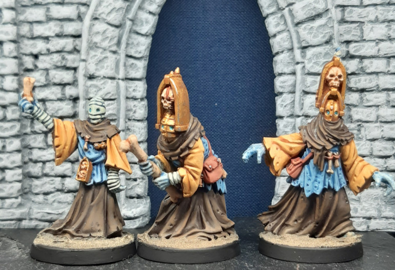 A trio of priests/cultists by Meridian Miniatures from their ongoing collaboration with Black Crab Art.