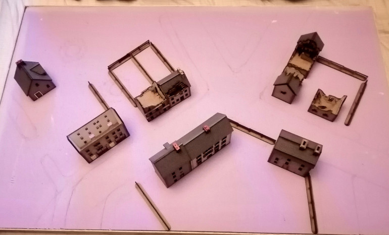 Starting to layout my buildings, I have another ten and a church for the 3rd board. Will be trying new things with two texture rollers for the pavement and cobblestone roads. These buildings are from empires at war.