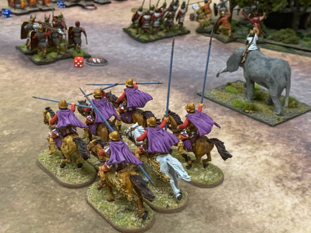 Starting position showing where the Phyrric force and the Carthaginian force meet. In front of the cavalry are a unit of pikemen. There’s a gap for the cavalry to shoot through directly to the opposing Carthaginian Hoplites. The elephant is part of Alvaro’s army who is my ally for this battle. 