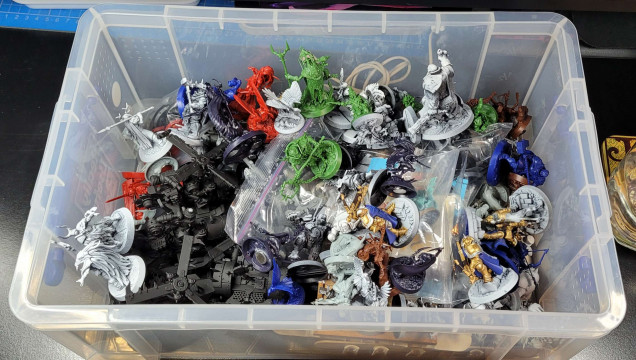 The actual box. Less mysterious, less grandiose. Full of minis though. 