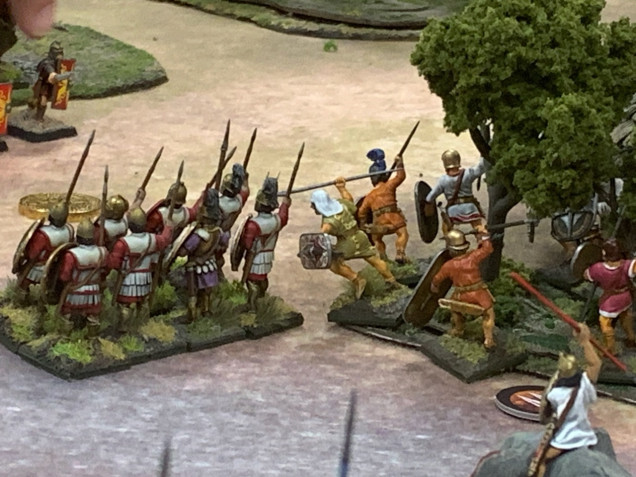 The Carthaginian heavy infantry move forward to contest an objective while shadowed by some javelin throwers. Just off screen are some Roman infantry reforming after exiting some woods. 