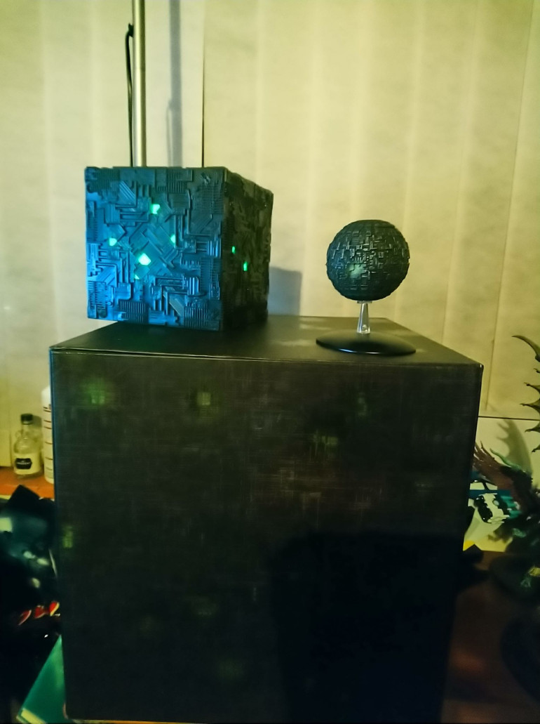 the cube with eaglemoss's cube (the model is a foot tall /wide) and sphere