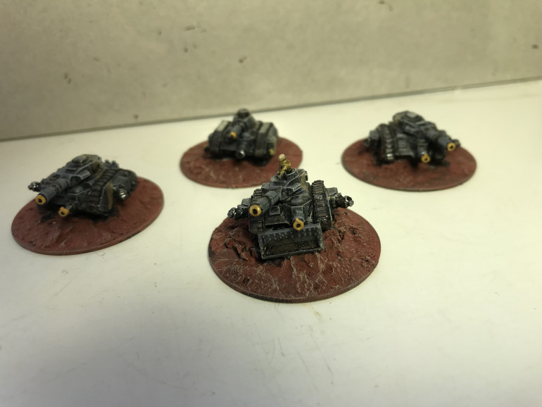 A unit of teeny tiny steel legion lemun russ tanks