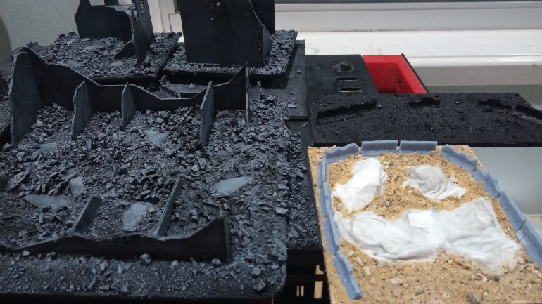 I used Geek Gaming Scenics Desert Basing Mix to simulate a bunch of rubble and destruction. I went back and forth on using this stuff and if I did it again I would mix a bit more finer sand in the mix but I'm very happy with how they turned out.  