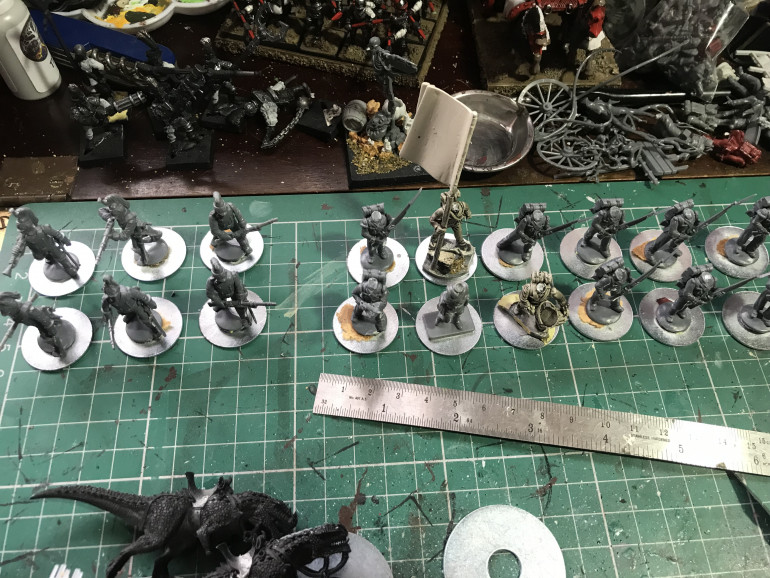 Decided to base the dudes on washers to give them some heft and to help with storage on magnetic trays