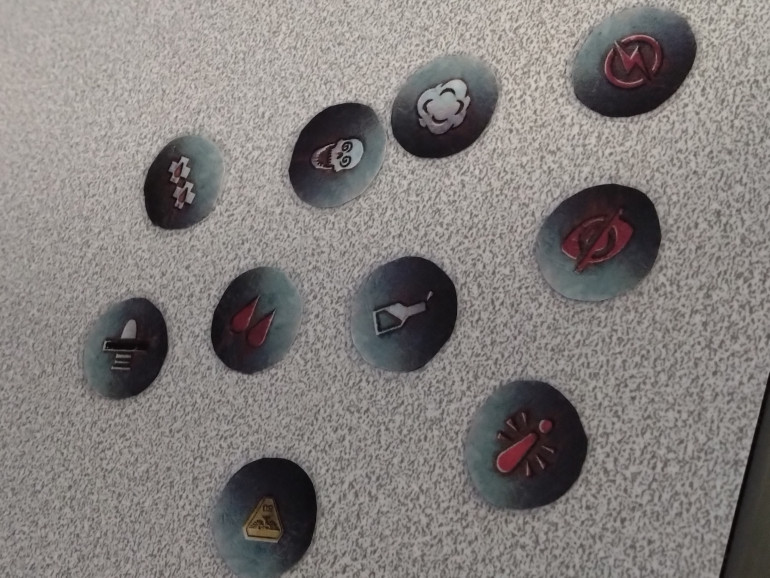 Double sided tokens and the printout was pretty close to spot on when cutting them out. Laminated and cut out ready for a game when I get that far.