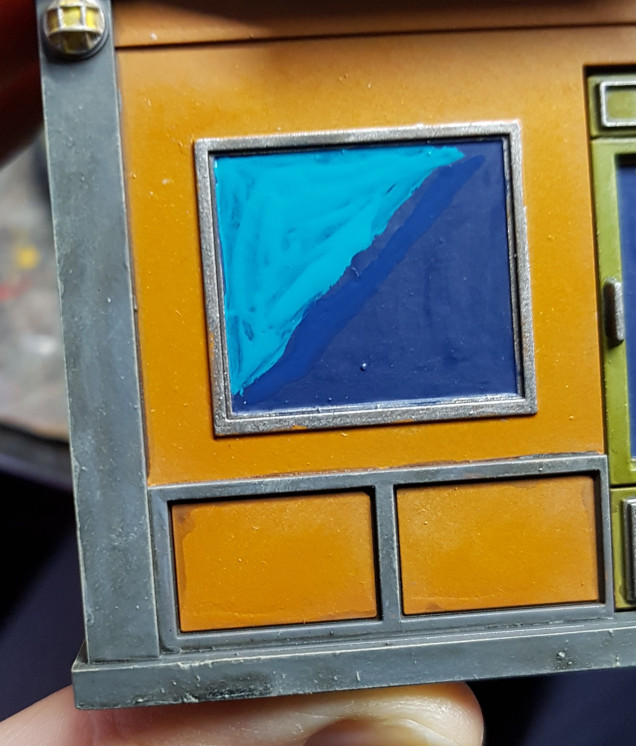 Prepare some P3 Exile Blue and P3 Meridius Blue on your palette.  Mix with the bare minimum water only.  Paint the high point of the window with Meridius Blue, and then put a line of Exile Blue along it.  DO NOT LET THEM DRY!  Act quick!