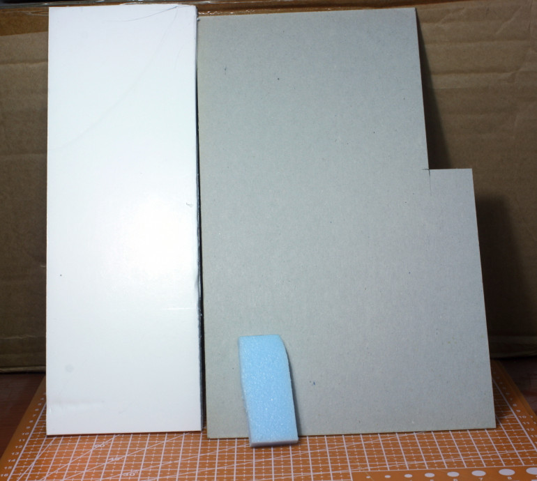Foam-board, thick cardboard and pieces of Styrofoam.