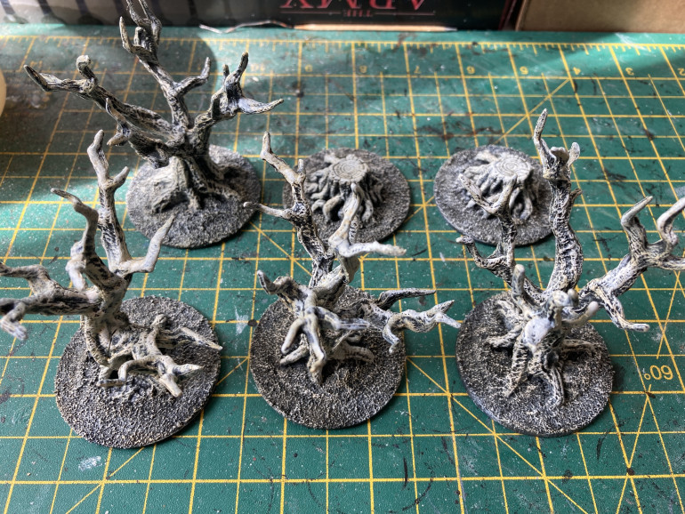 Once the black primer was dry I drybrushed them with a light beige colour followed by white.