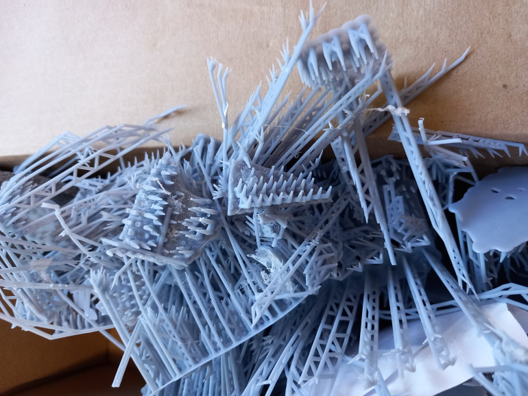 After taking up 3D printing I thought of a use for the supports and made a cage which is needed for one of the original books scenarios