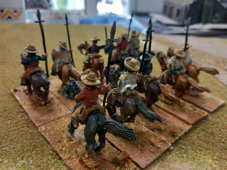 An interesting change in style for a Mexican unit not in fancy uniforms. These chaps represent ranchers. Ranchers and civilians acting as scouts. Good to add some colour to ponchos