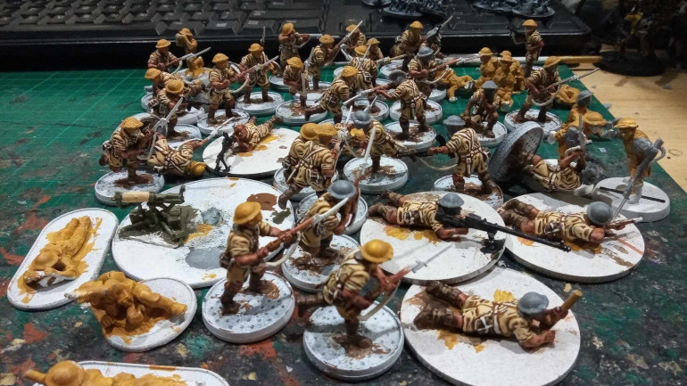 Australian's almost exclusively favoured the Brodie Helmet in Malaya so I did a bit of looking in the bits box and a bit of swapping with a friend to get all the heads I needed.