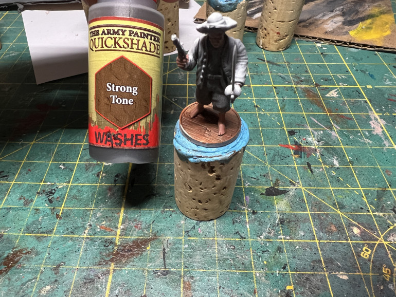 Once the bases color is dry, use some darktone wash to accentuate the wood patterns.I intwedn on highlighting the wood later but even at this sage, the base will look good enough for tabletop.