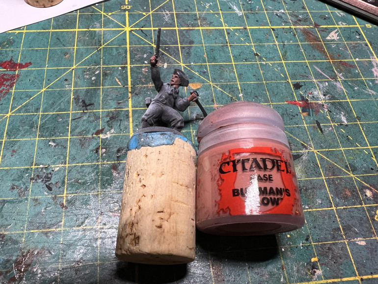 I always like to paint from the inside out and thus startd with the skin Bugman's Glow from GW. Do not forget the feet (I did) as some miniatures are bare feet.