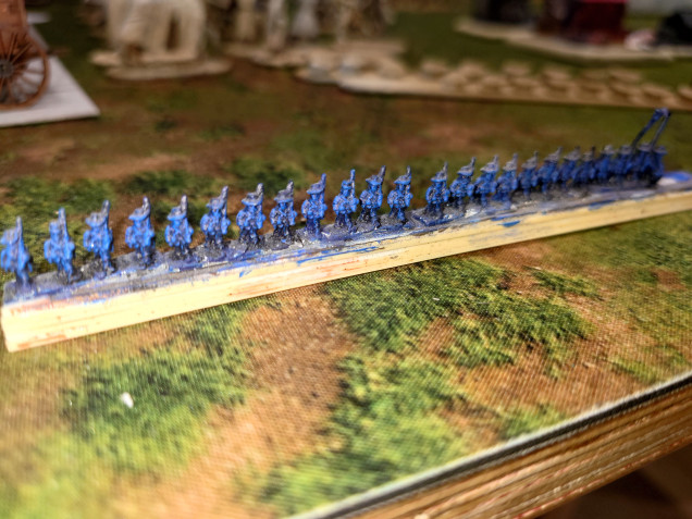 As strip of 24 partially painted Union Troops.