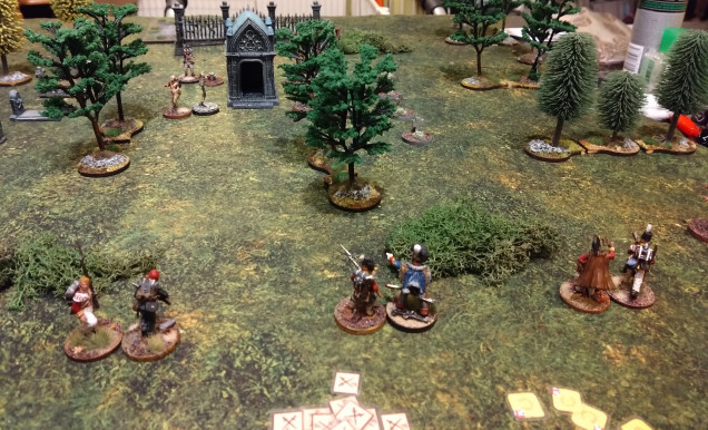 I like this layout. The graveyard terrain and my MDF off cut gravestones work out fine and set the scene.