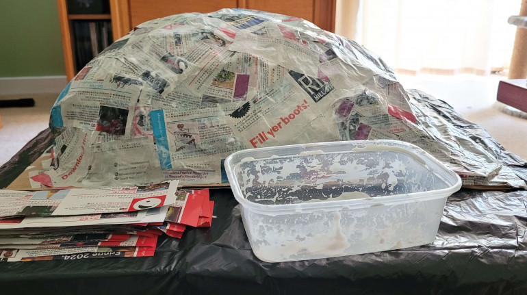Papier-mâché obviously. Hard to do these days when people don't have lots of newspapers sitting around... Thankfully Edinburgh had thousands of kilos of extra Fringe guides come early September. Now to leave it to dry for a day or two