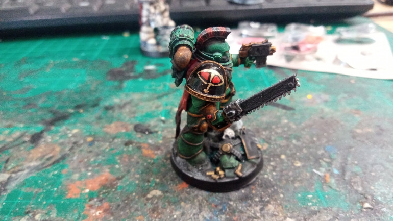 I saw an image of the Loken Mini with glossy shoulderpads and I really liked it, I had a go at the freehand eye of Horus, not great but it will work for my own personal collection.