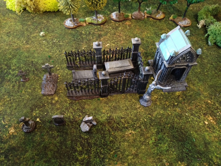 Mantic Games graveyard terrain crate seemed to fit the bill for this scenario.