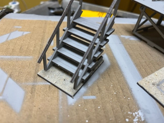 The stairs seemed a little more wobbly so I did glue them to the base and once the assembly dried, I added the sand in the same way as with the stage. 