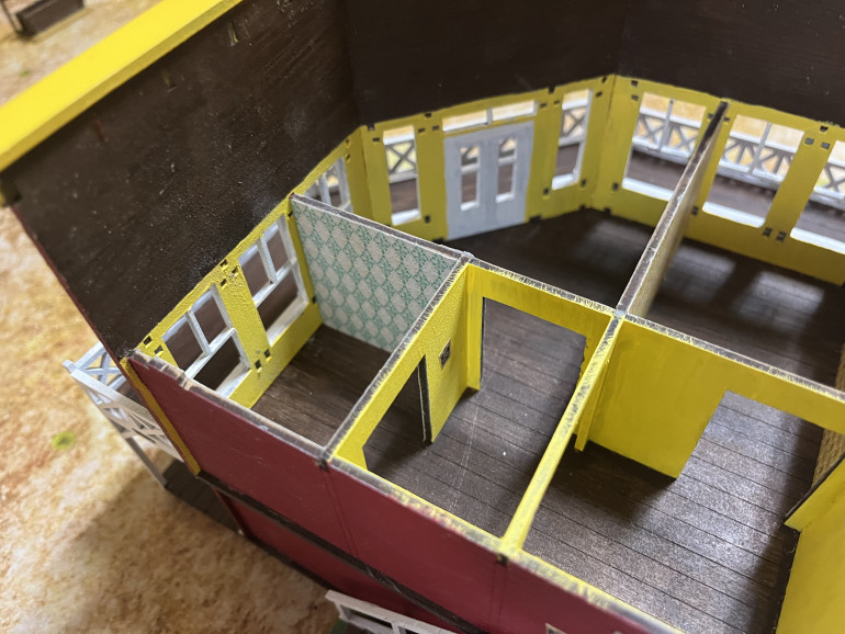 Roof removed showing the interior view of the second floor.