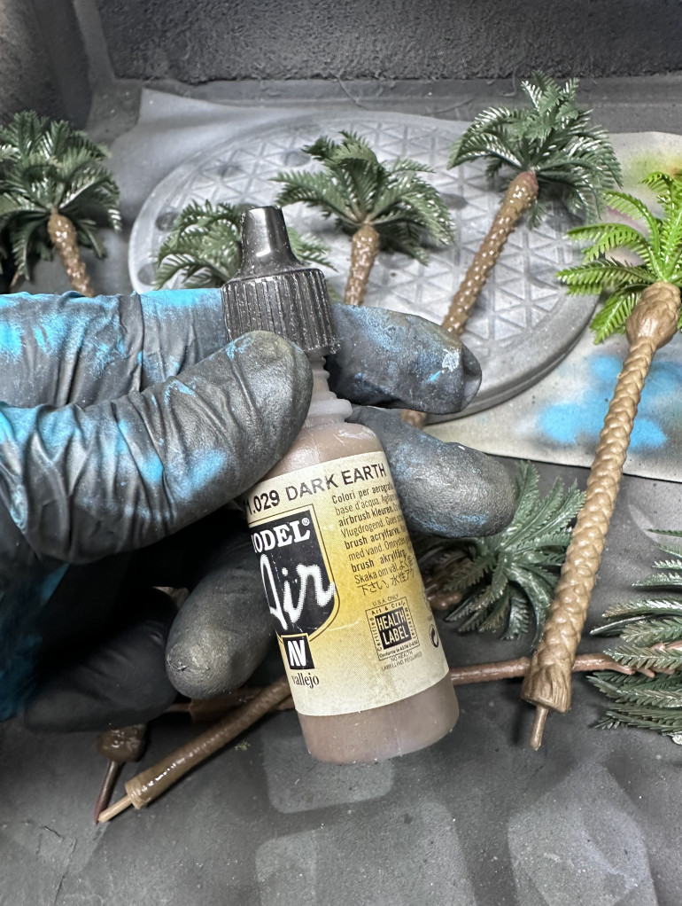 Airbrush the trunks with Vallejo Dark Earth