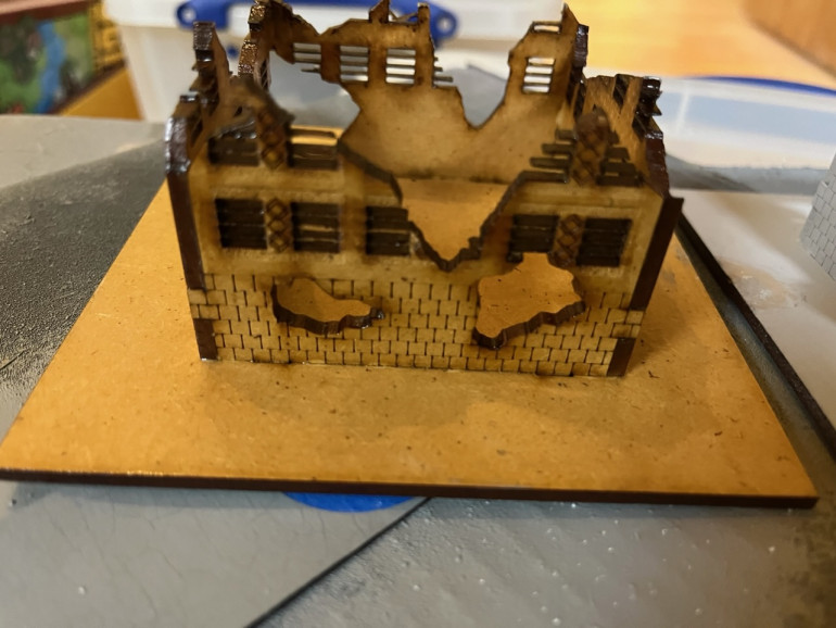 A different building with two coats of brushed on lacquer.