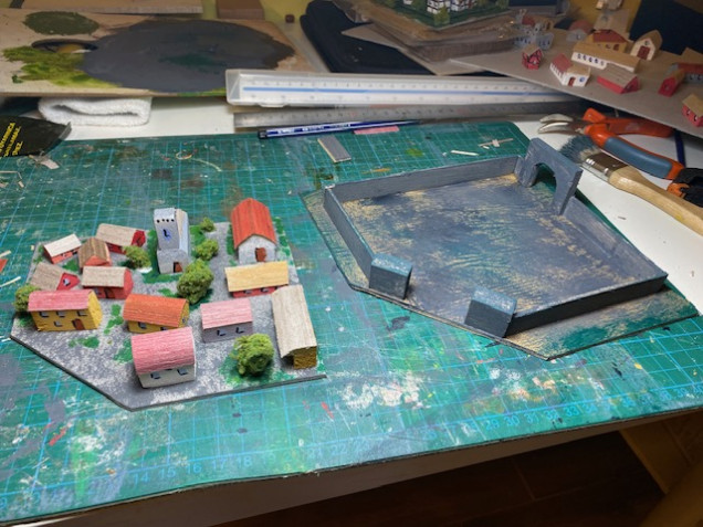 Town tile with additional trees, and base with walls/gates. Doors still to add to the gates