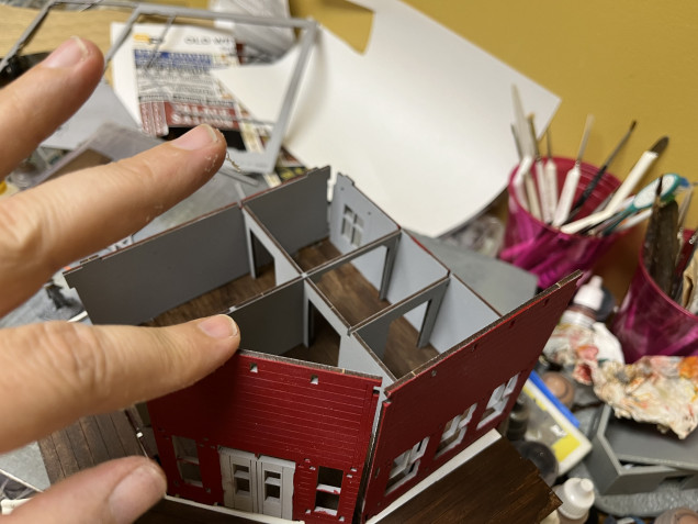 Interior detail of the second floor with the roof removed. 