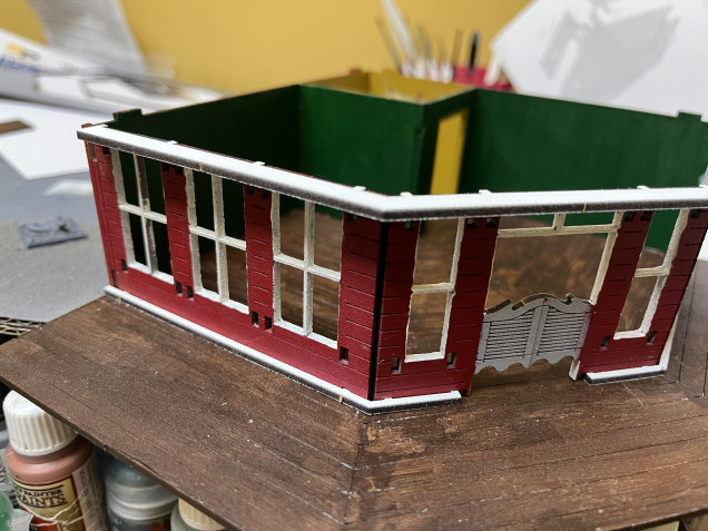 Once everything dried, I started gluing everything into place. Note the upper and lower lintels in white need their edges painted. I glued the upper lintel in place to help align the walls while the glue was drying.  It’s fairly accessible so I’ll paint the edge after the glue dries. The lower lintel is just dry fitted to help with alignment. Once the glue dries I’ll pull it out, paint the edge and then glue it back in place. 