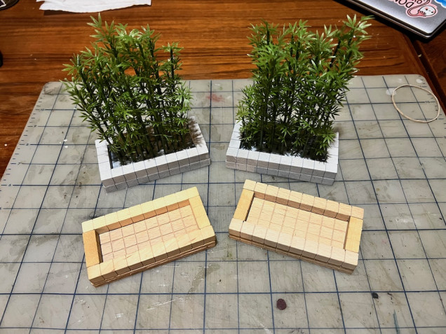 Two planters planted though still awaiting ground work. Made two more planters as I think four would look much nicer on the table.