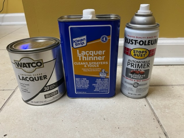Brush on lacquer and lacquer thinner to clean the brush.  If you’ve never used lacquer, use outdoors are in a very well ventilated area. I’m also trying standard hardware store spray primer, Krylon in this case, as it’s much less expensive than hobby primer. 