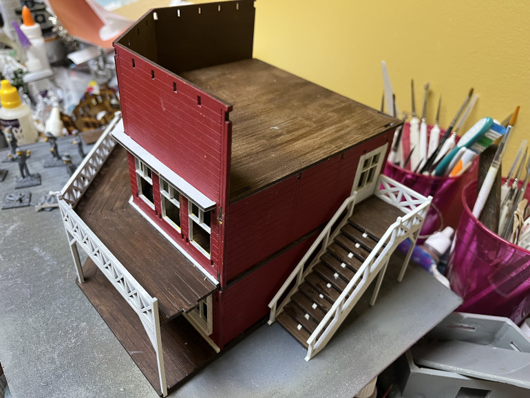 View showing roof and stairs in place and the false front.