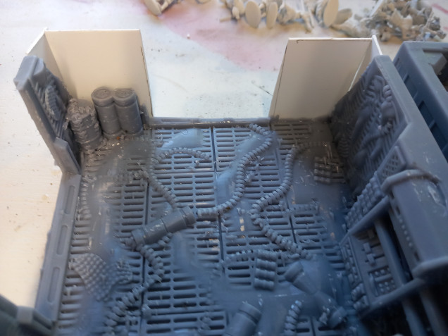 I printed two corner hive pieces from lv427 designs but made a user error and ran out of resin on the second print. Good news us itsxa hive section so with the help of some card and bits box ounces I can disguise the wLls with plaster. To be honest the plaster looks better to me as a hive wall and it saved a print error 