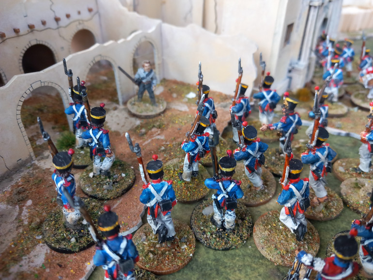 After galling back yhe Greys are left open to a firing squad style execution with the volunteer lieutenant the last to be shot down and no amount of fame and fortune can save crocket as he is finally cut down in the Chapel. Santa Anna has his victory