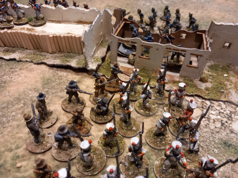 As Mexicans storm the compound the retreating texans try and stem the tide but are beaten back. Fleeing texans are shot down.