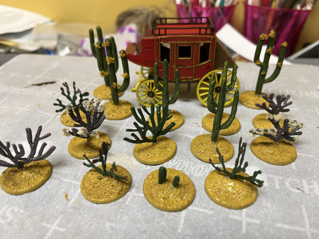 The cacti are looking much better with a little Desert Yellow paint. A like dry brushing and maybe a bit more base work to go. 